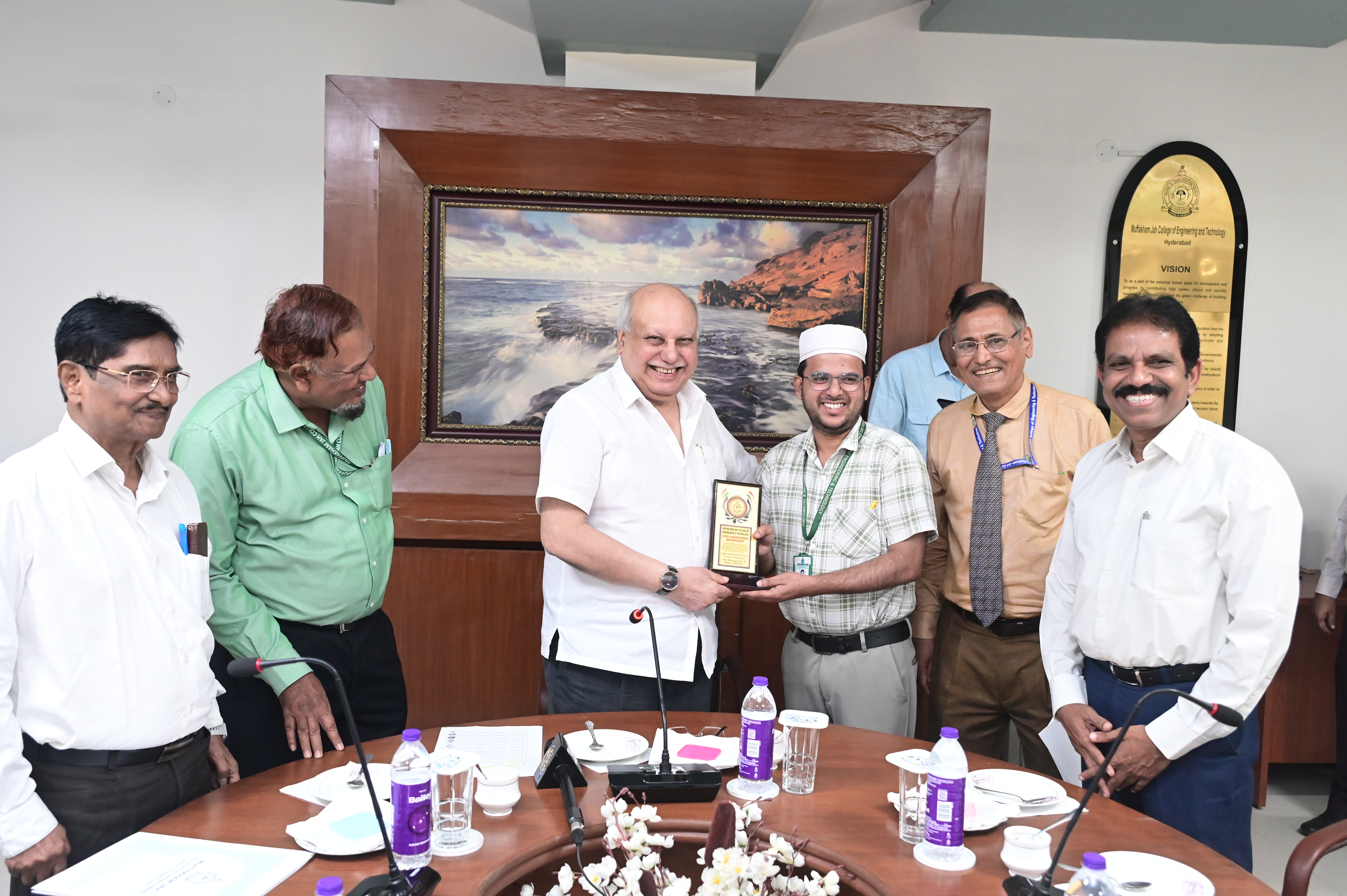Mr. Mohd Nazim Raza, TPBO receiving memento from Hon. Secretary Janab Zafar Javeed, SUES